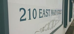 210 East Main Street sign